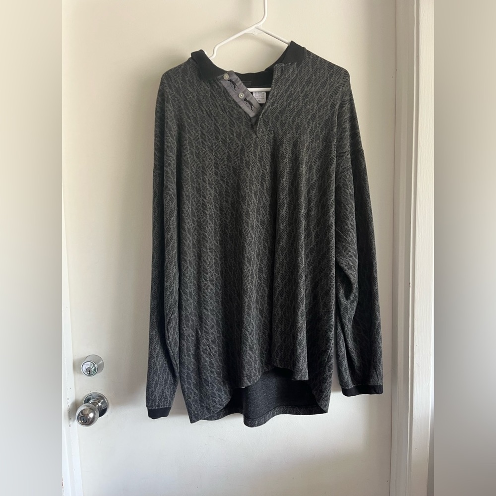 Black extra large, long sleeve men’s sweater with collar.
